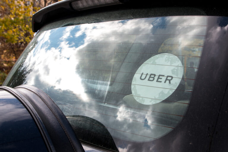 Uber car with official sticker - Endeavour Partnership